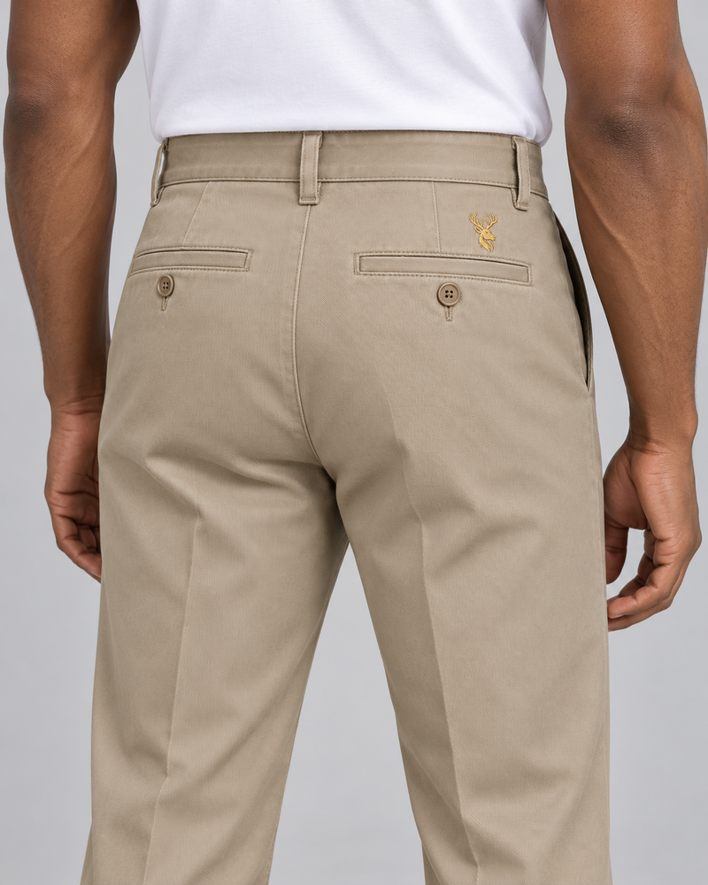 INTERVAL / 01 Men's Ledger Pleated Trouser — Stone, Worn logo and fabric detail