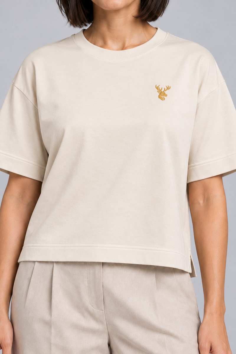 INTERVAL / 01 Women's Fold Box Tee — Cream, Worn logo and fabric detail